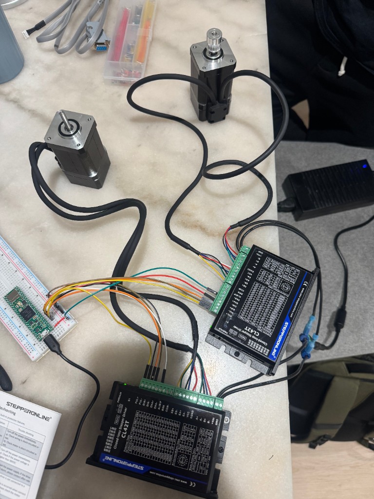 Stepper motors, CL42T drivers, and Teensy on a breadboard during first bring-up